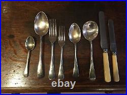 46 piece silver plate cutlery set in oak canteen side table