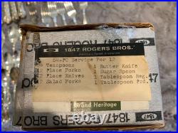 64 piece set of Rogers Bros 1847 IS Heritage pattern in paper box silver-plate
