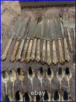 64 piece set of Rogers Bros 1847 IS Heritage pattern in paper box silver-plate