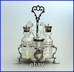 A fine antique silver plate Warwick type cut glass 5 bottle Cruet C. 1863/64