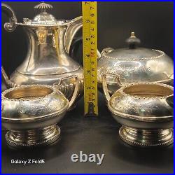 A silver plated three piece tea set together with a similar plated coffee pot