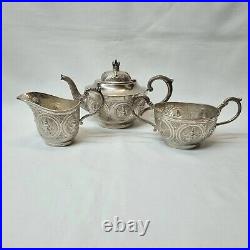 Antique Indian silver plated copper three piece tea set, pot, jug & sugar bowl