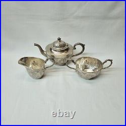Antique Indian silver plated copper three piece tea set, pot, jug & sugar bowl