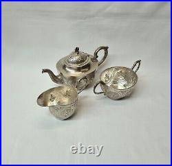 Antique Indian silver plated copper three piece tea set, pot, jug & sugar bowl