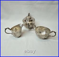 Antique Indian silver plated copper three piece tea set, pot, jug & sugar bowl