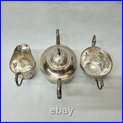Antique Indian silver plated copper three piece tea set, pot, jug & sugar bowl