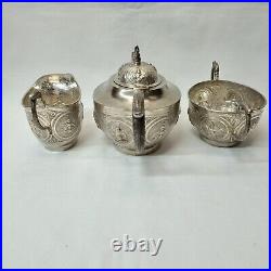 Antique Indian silver plated copper three piece tea set, pot, jug & sugar bowl