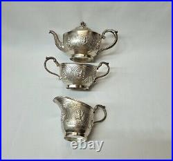 Antique Indian silver plated copper three piece tea set, pot, jug & sugar bowl