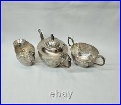 Antique Indian silver plated copper three piece tea set, pot, jug & sugar bowl