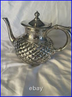 Antique Meriden Silver Plate Co Quadruple Plate Four-Piece Tea Set Antique Meriden Silver Plate Co Quadruple Plate Four-Piece Tea Set
