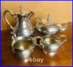 Edwardian Art Nouveau Silver Plate Four-Piece Tea Service by James Dixon &