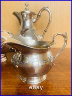 Edwardian Art Nouveau Silver Plate Four-Piece Tea Service by James Dixon &