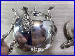 Elegant Silver Plated 4 Piece Footed Ornate Tea & Coffee Set shiny condition Elegant Silver Plated 4 Piece Footed Ornate Tea & Coffee Set shiny condition