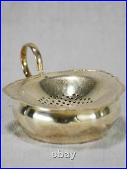 English two-piece tea strainer from the 1930's silver plate