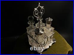 George Travis & Co, Silver Plate & Cut Glass 4 Piece Cruet Set George Travis & Co, Silver Plate & Cut Glass 4 Piece Cruet Set