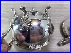 Vintage elegant Silver Plated 4 Piece Footed Ornate Tea & Coffee Set shiny cond